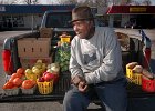 TruckbedProduceMan copy  Sam Brewton waits for customers as he sells some produce out of his pickup truck along S.Church St. in Spartanburg, SC Friday evening, 2-3-06. Brewton, 86, was selling tomatoes, apples, turnips, and collards and has his own small farm in Spartanburg. He states he can still drive a tractor and says he &#34;hopes the good Lord will let me&#34; drive it again this coming year. (AP Photo/Spartanburg Herald-Journal/Tim Kimzey)